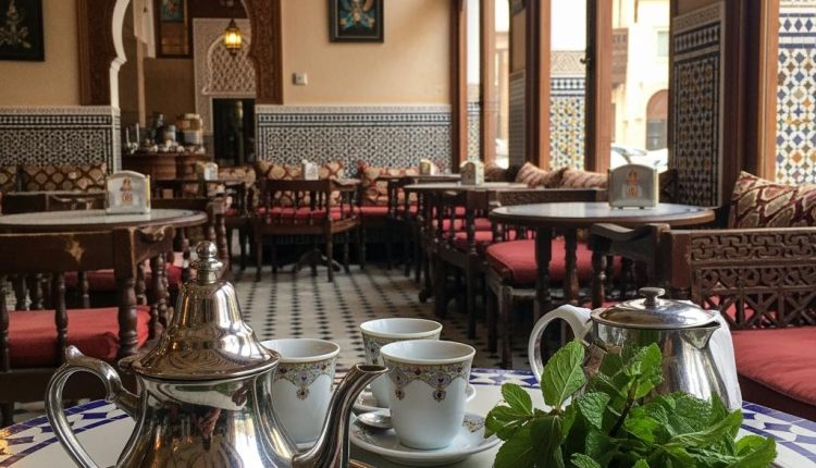 A Moroccan mint tea session in a cafe with sweet almonds in Souss Massa without people_image_1